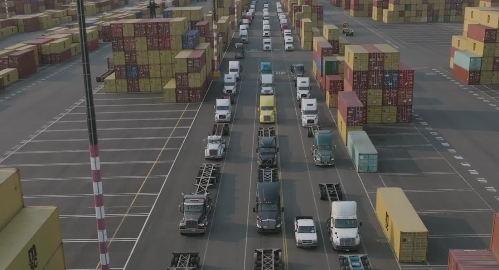 Trucks moving cargo at port